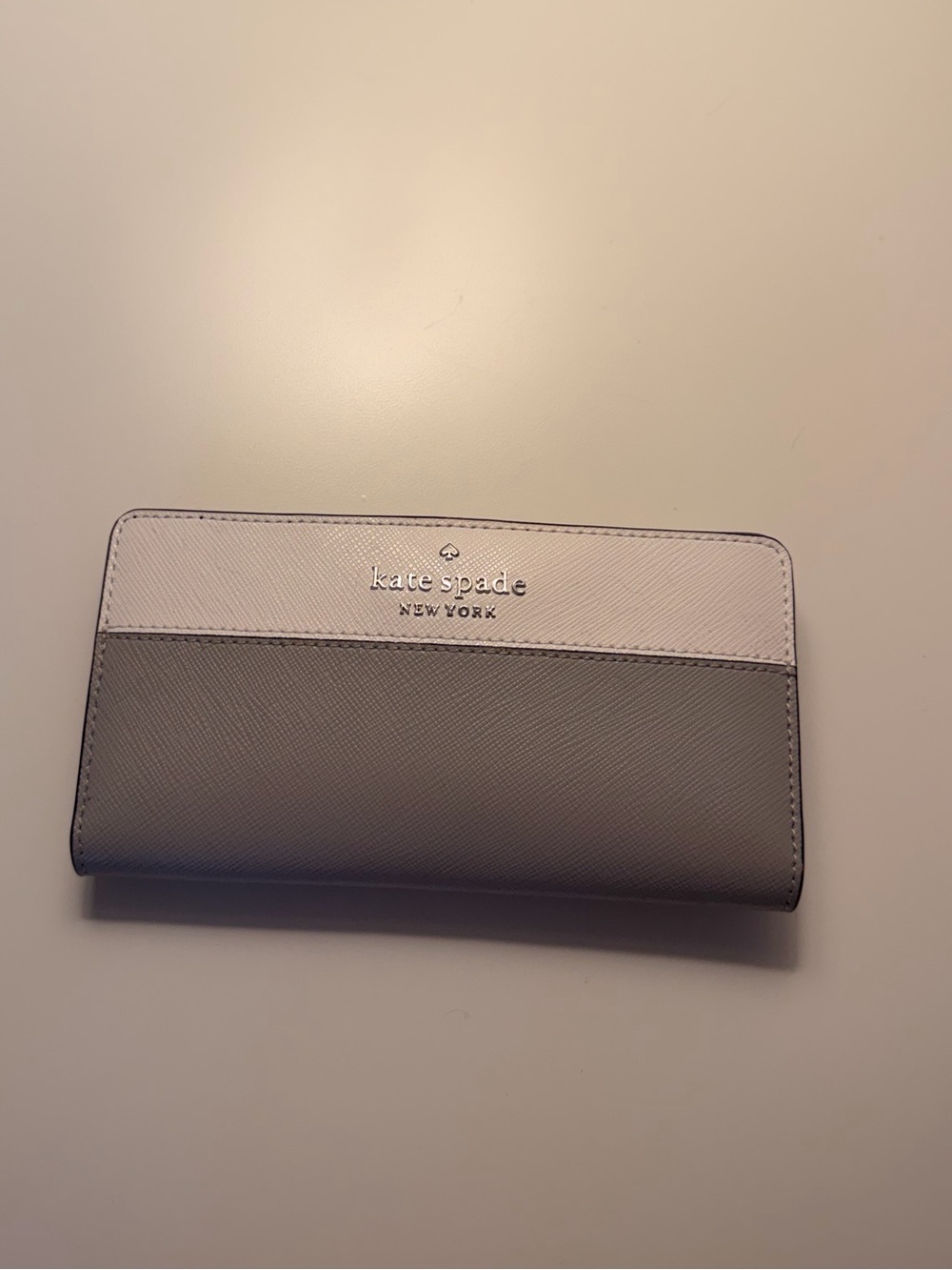 kate spade two-tone continental wallet in blush pink and taupe